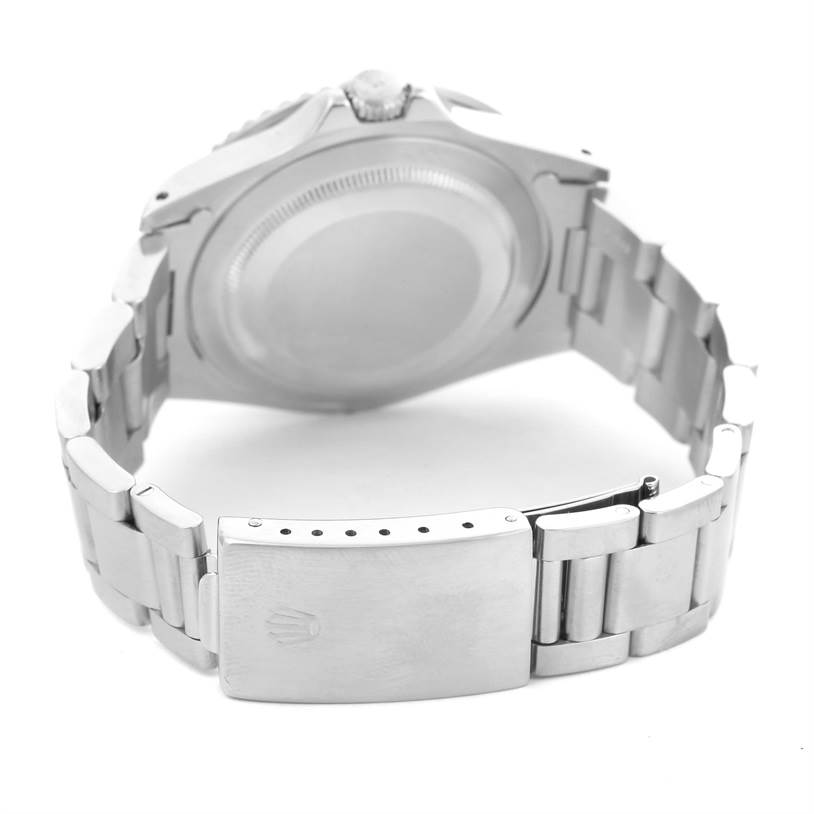 The image shows the back case and bracelet of a Rolex GMT-Master 16700 Men
s Stainless Steel Black Dial 16700 Men
s Stainless Steel Black Dial watch from a rear angle.