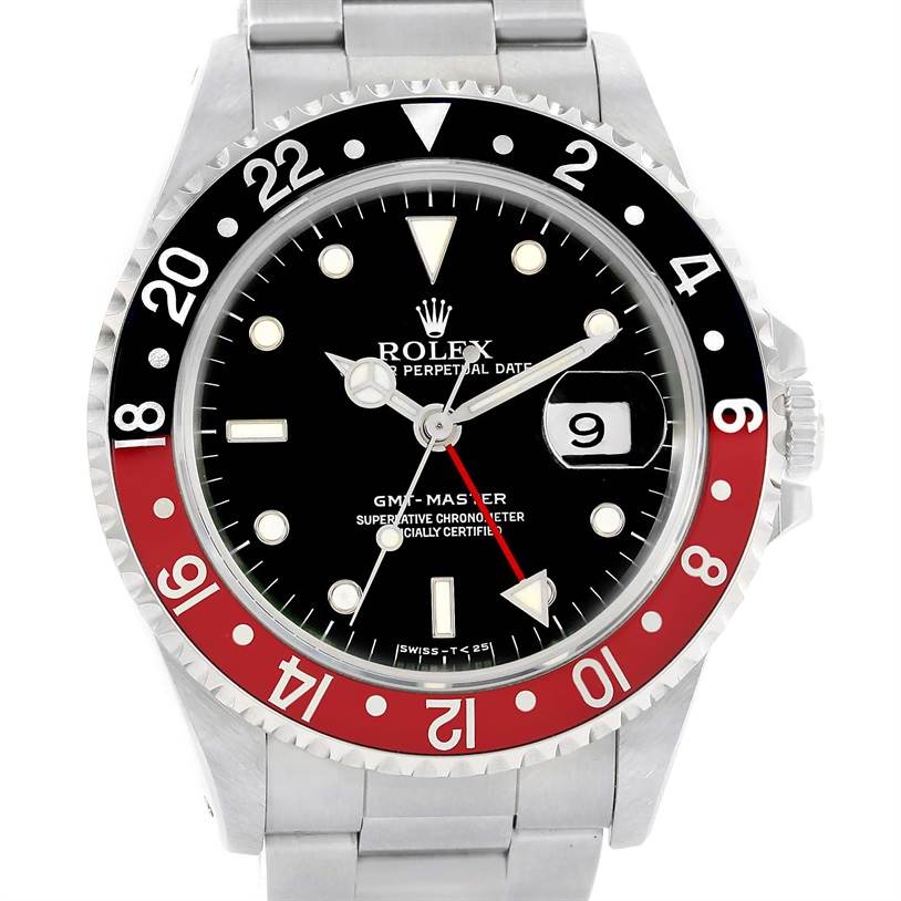 The image shows a frontal view of a Rolex GMT-Master 16700 Men
s Stainless Steel Black Dial 16700 Men
s Stainless Steel Black Dial watch, displaying the bezel, dial, hands, and part of the bracelet.