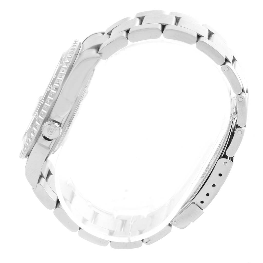 The image shows a side view of a Rolex GMT-Master 16710 Men's Stainless Steel Black Dial 16710 Men's Stainless Steel Black Dial watch, highlighting the bracelet, crown, and case.