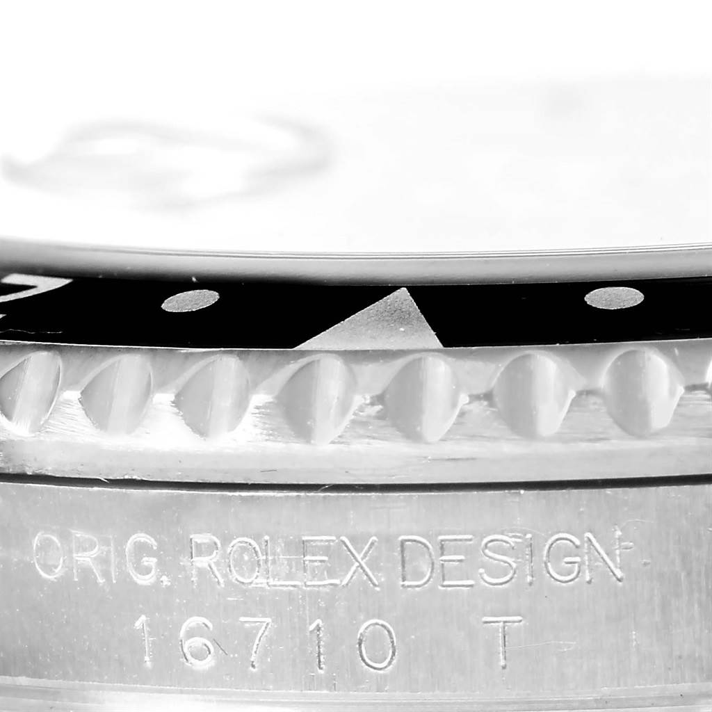 Close-up of the case side and bezel of a Rolex GMT-Master 16710 Men's Stainless Steel Black Dial 16710 Men's Stainless Steel Black Dial model, showing the serial number "16710".