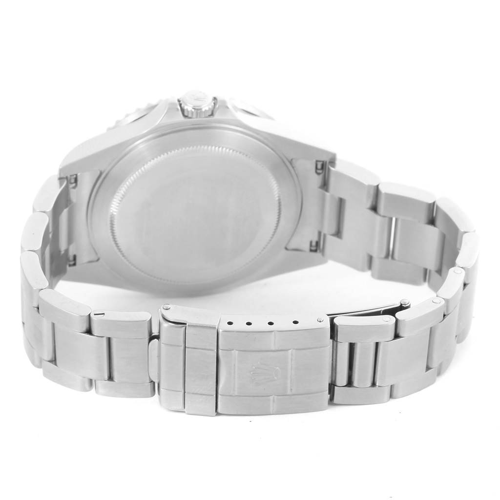 This image shows the back case and the clasp of the bracelet of a Rolex GMT-Master 16710 Men's Stainless Steel Black Dial 16710 Men's Stainless Steel Black Dial watch.