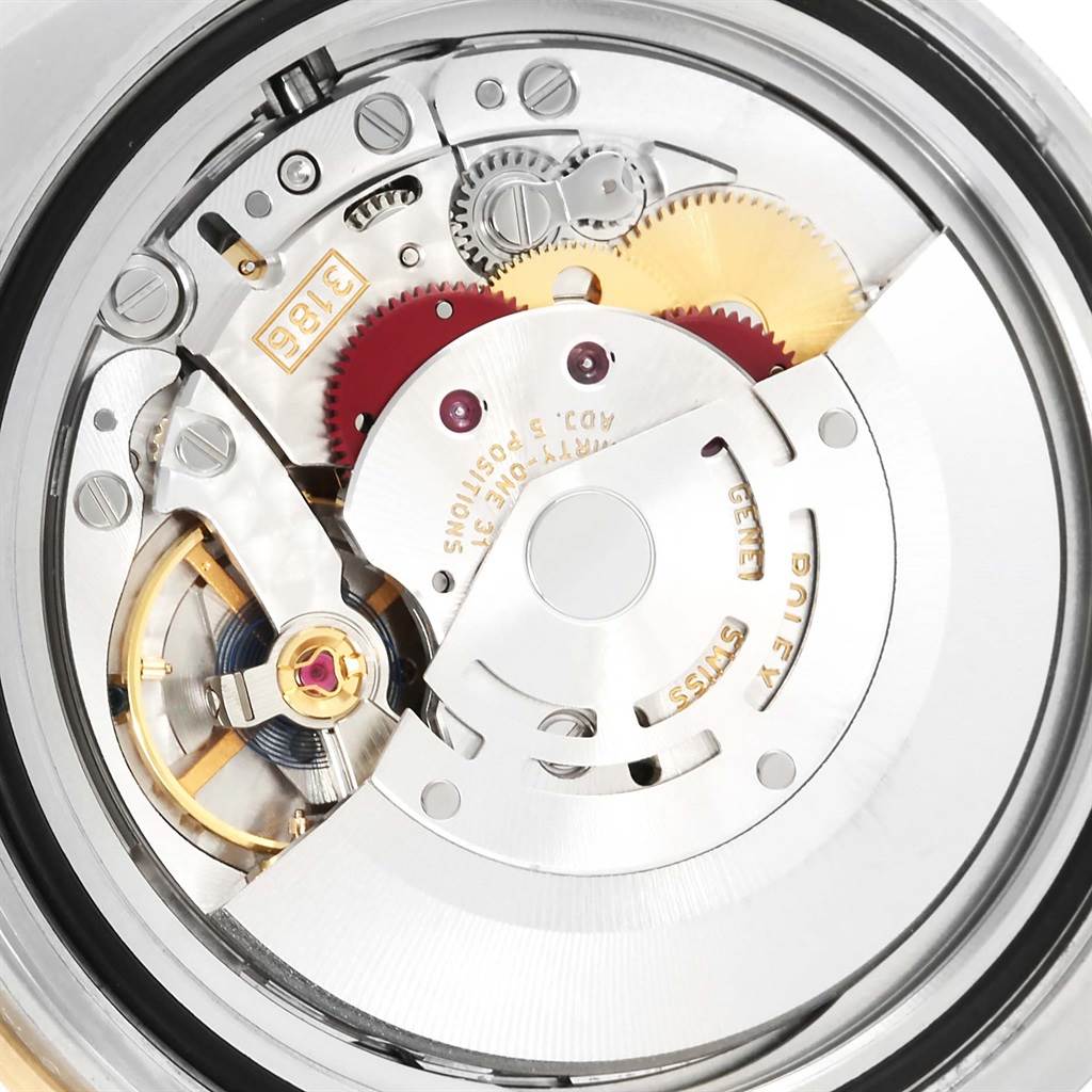 This image shows the internal mechanism and movement of a Rolex GMT-Master 116713 Men's Stainless Steel Black Dial 116713 Men's Stainless Steel Black Dial watch from a close-up angle.