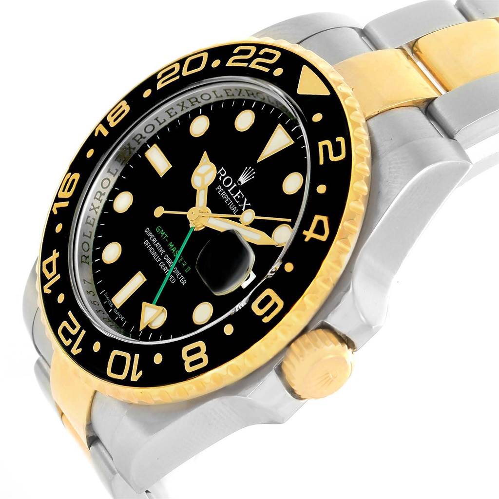 This image shows a close-up angled view of the face, bezel, and part of the bracelet of a Rolex GMT-Master 116713 Men's Stainless Steel Black Dial 116713 Men's Stainless Steel Black Dial watch.