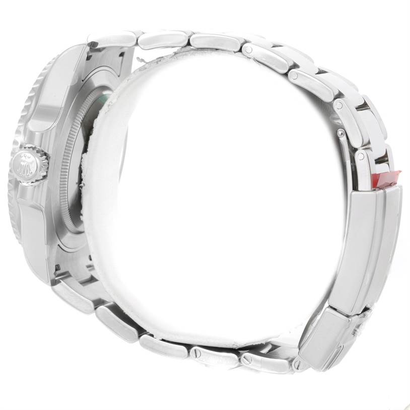 This image shows a side view of the Rolex GMT-Master 116710 Men's Stainless Steel Black Dial 116710 Men's Stainless Steel Black Dial watch, focusing on its stainless steel case, crown, and bracelet.