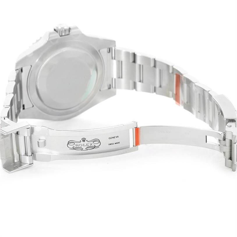 The image shows the back of the GMT-Master Rolex watch, highlighting the open clasp and bracelet.