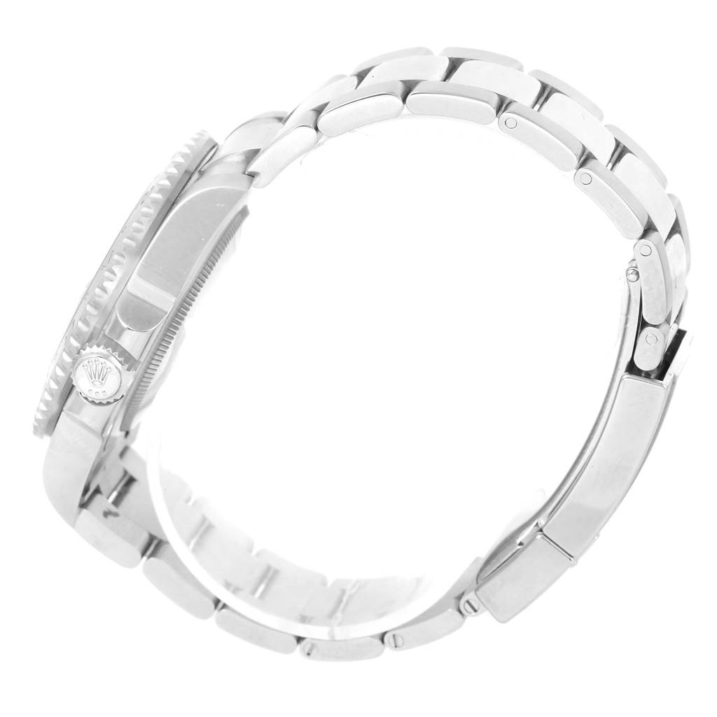 The image shows a side angle of a Rolex GMT-Master 116710BLNR Men's Stainless Steel Black Dial 116710BLNR Men's Stainless Steel Black Dial watch, highlighting its crown, case, and metal bracelet.