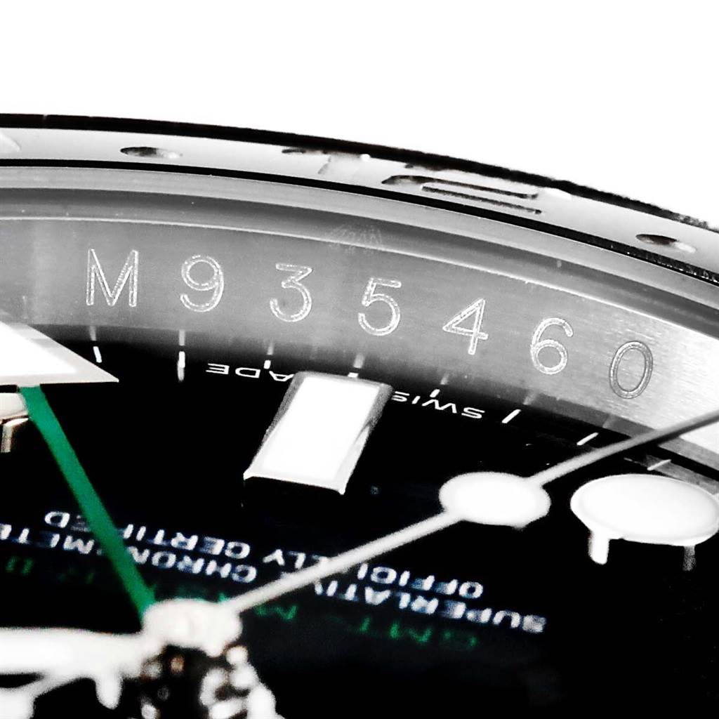 The image shows a close-up of the dial and inner bezel with a serial number of a Rolex GMT-Master 116710 Men's Stainless Steel Black Dial 116710 Men's Stainless Steel Black Dial watch.