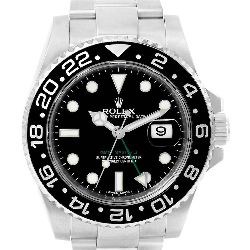 The image shows a frontal view of a Rolex GMT-Master II watch, highlighting its dial, bezel, and bracelet.