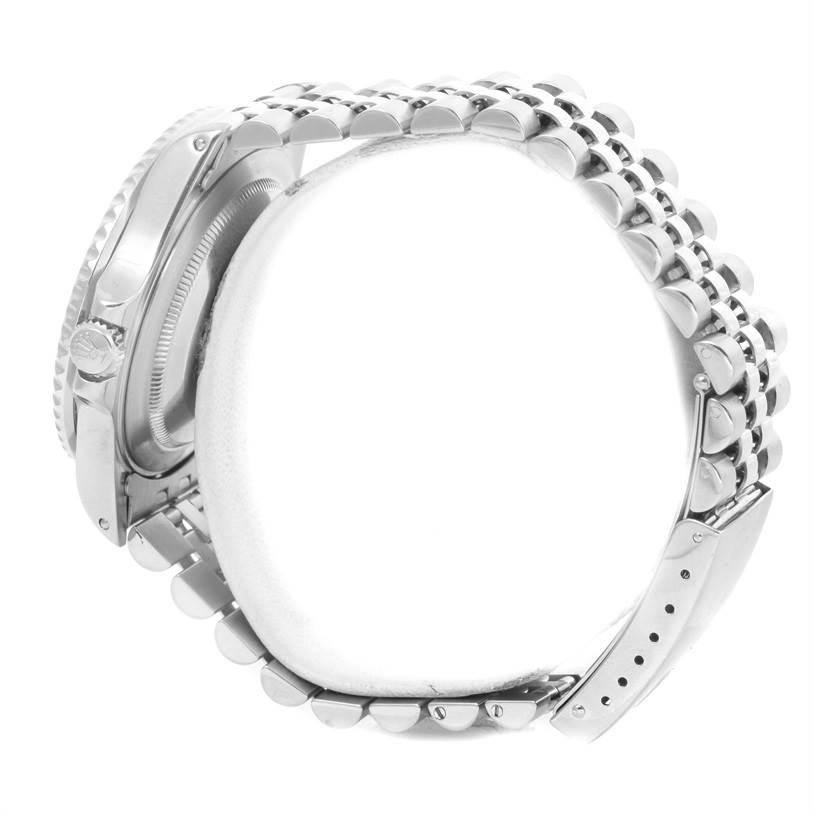 The image shows a side view of the Rolex GMT-Master 16710 Men's Stainless Steel Black Dial 16710 Men's Stainless Steel Black Dial's case, crown, and bracelet.