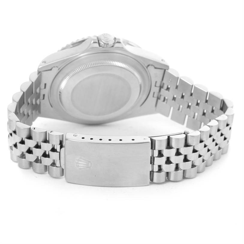 The image shows the back and bracelet of a Rolex GMT-Master 16710 Men's Stainless Steel Black Dial 16710 Men's Stainless Steel Black Dial watch, featuring its clasp and case back.