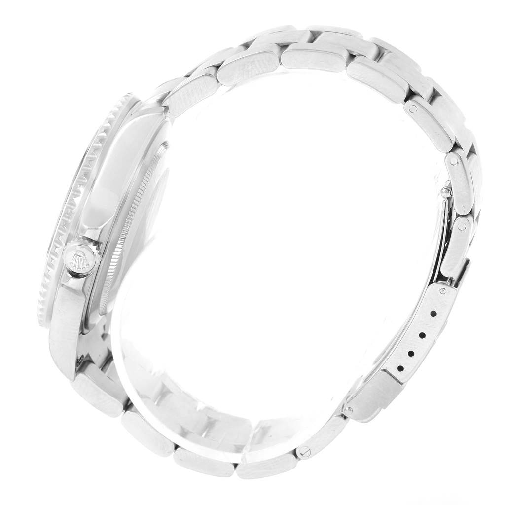 This image shows a side profile of the Rolex GMT-Master 16710 Men's Stainless Steel Black Dial 16710 Men's Stainless Steel Black Dial watch, highlighting the bracelet and the crown.