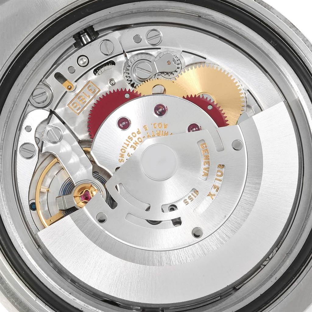 This image shows the internal mechanism and movement parts of a Rolex GMT-Master 116710 Men
s Stainless Steel Black Dial 116710 Men
s Stainless Steel Black Dial watch viewed from the back.