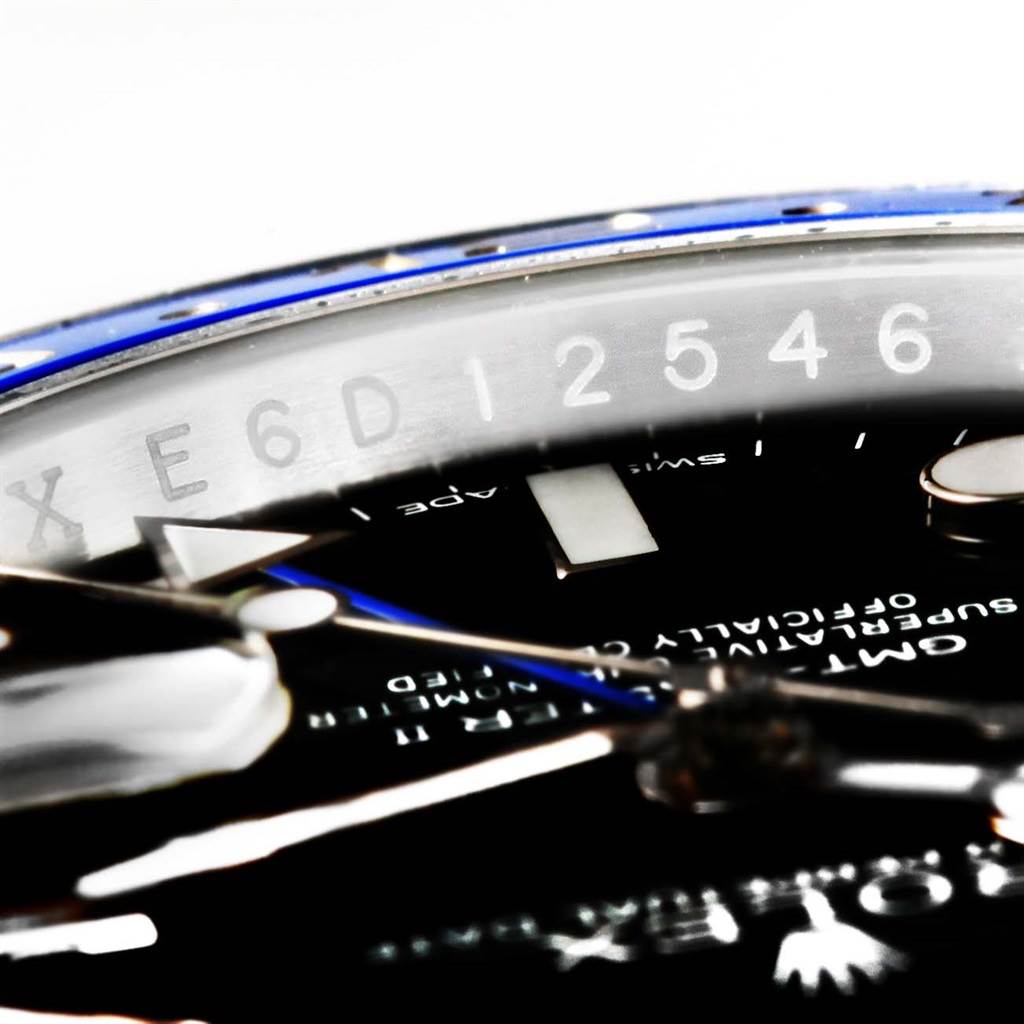 The image shows a close-up angle of a Rolex GMT-Master 116710 Men
s Stainless Steel Black Dial 116710 Men
s Stainless Steel Black Dial watch, focusing on the bezel, dial, and some text details.