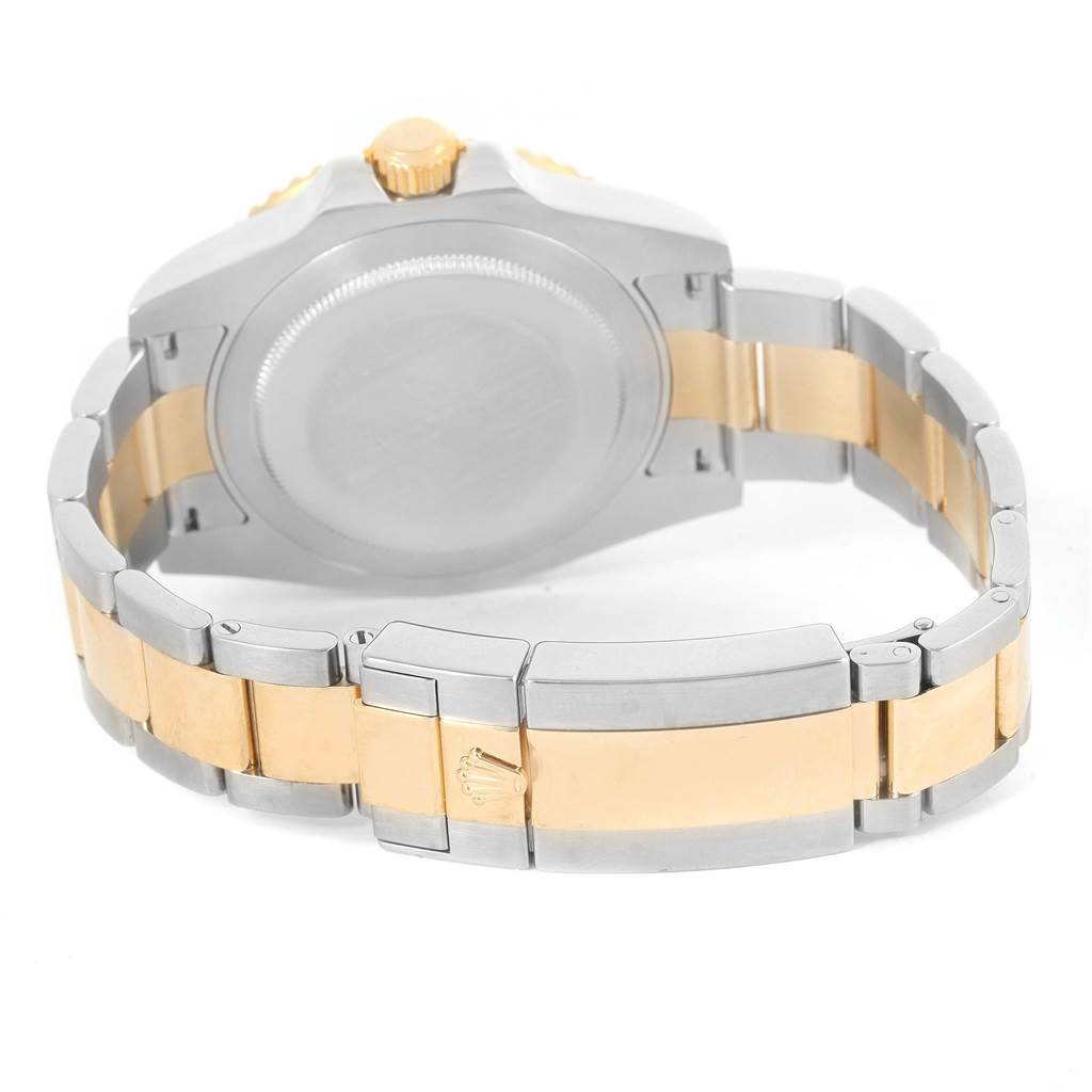 This image shows the back case and bracelet clasp of a Rolex GMT-Master 116713 Men's Stainless Steel Black Dial 116713 Men's Stainless Steel Black Dial watch from a rear angle.