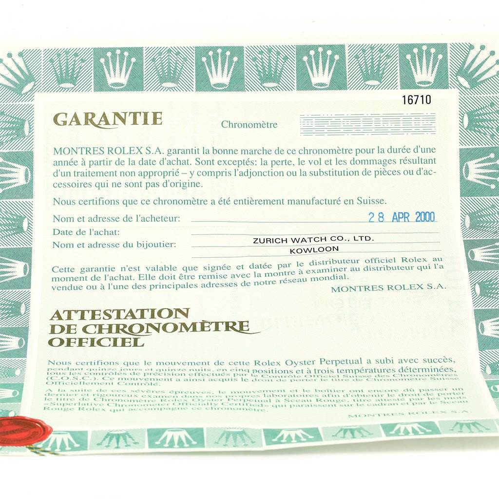 The image shows a warranty certificate for the Rolex GMT-Master 16710 Men's Stainless Steel Black Dial 16710 Men's Stainless Steel Black Dial model, including purchase details and official chronometer certification.