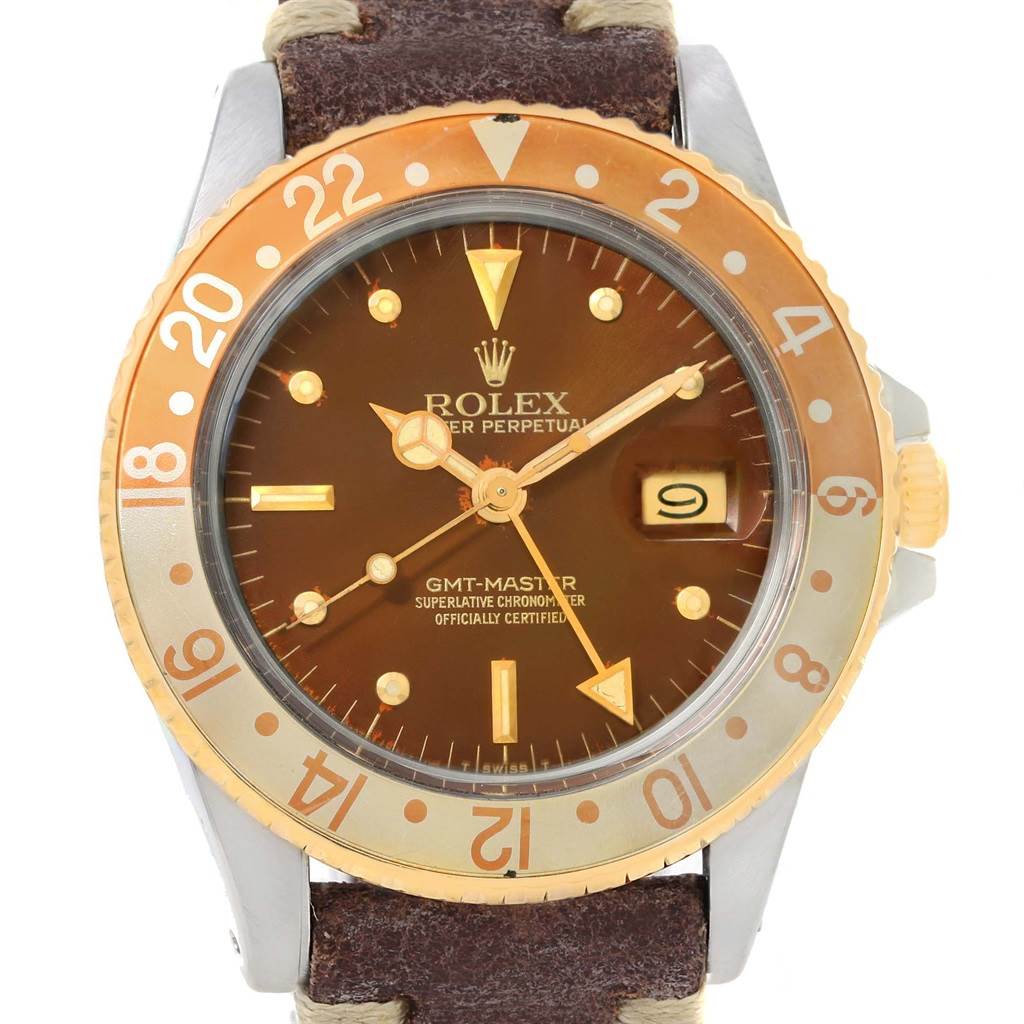 The image shows a front view of a Rolex GMT-Master 16753 Men's Stainless Steel Brown Dial 16753 Men's Stainless Steel Brown Dial watch displaying its dial, bezel, and strap.