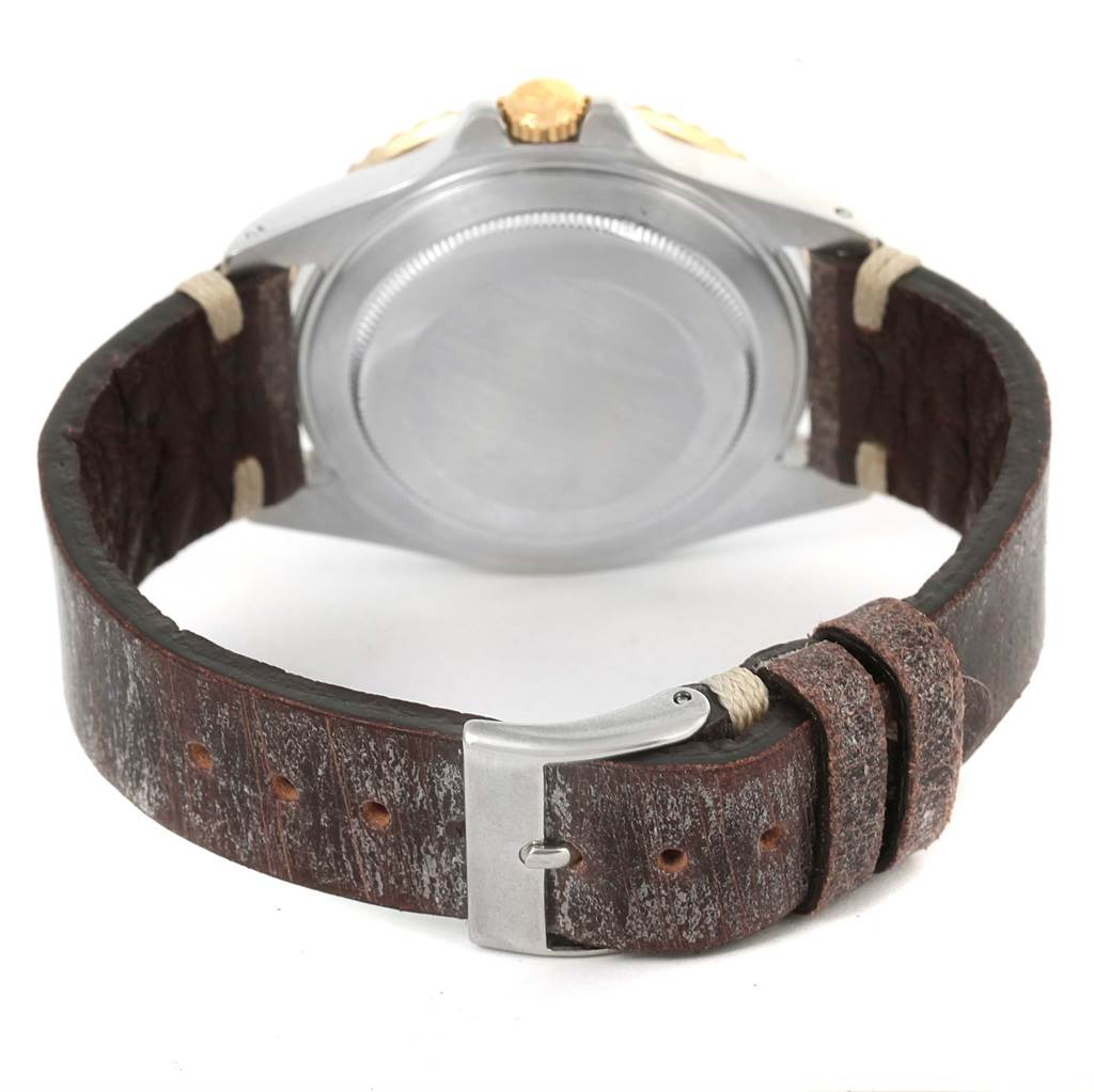 The image shows the back case and leather strap of the Rolex GMT-Master 16753 Men's Stainless Steel Brown Dial 16753 Men's Stainless Steel Brown Dial watch from a rear angle.