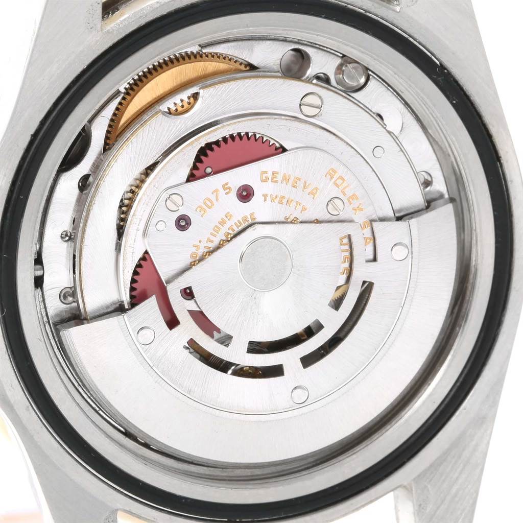 This image shows the movement mechanism of a Rolex GMT-Master 16753 Men's Stainless Steel Brown Dial 16753 Men's Stainless Steel Brown Dial watch from a close-up angle.