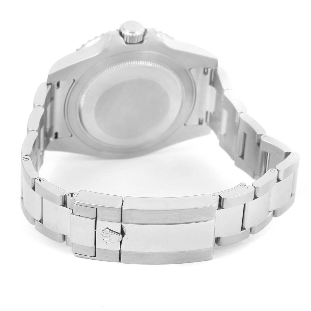 The image shows the back view of the Rolex GMT-Master 116710 Men's Stainless Steel Black Dial 116710 Men's Stainless Steel Black Dial watch case and the clasp of its metal bracelet.