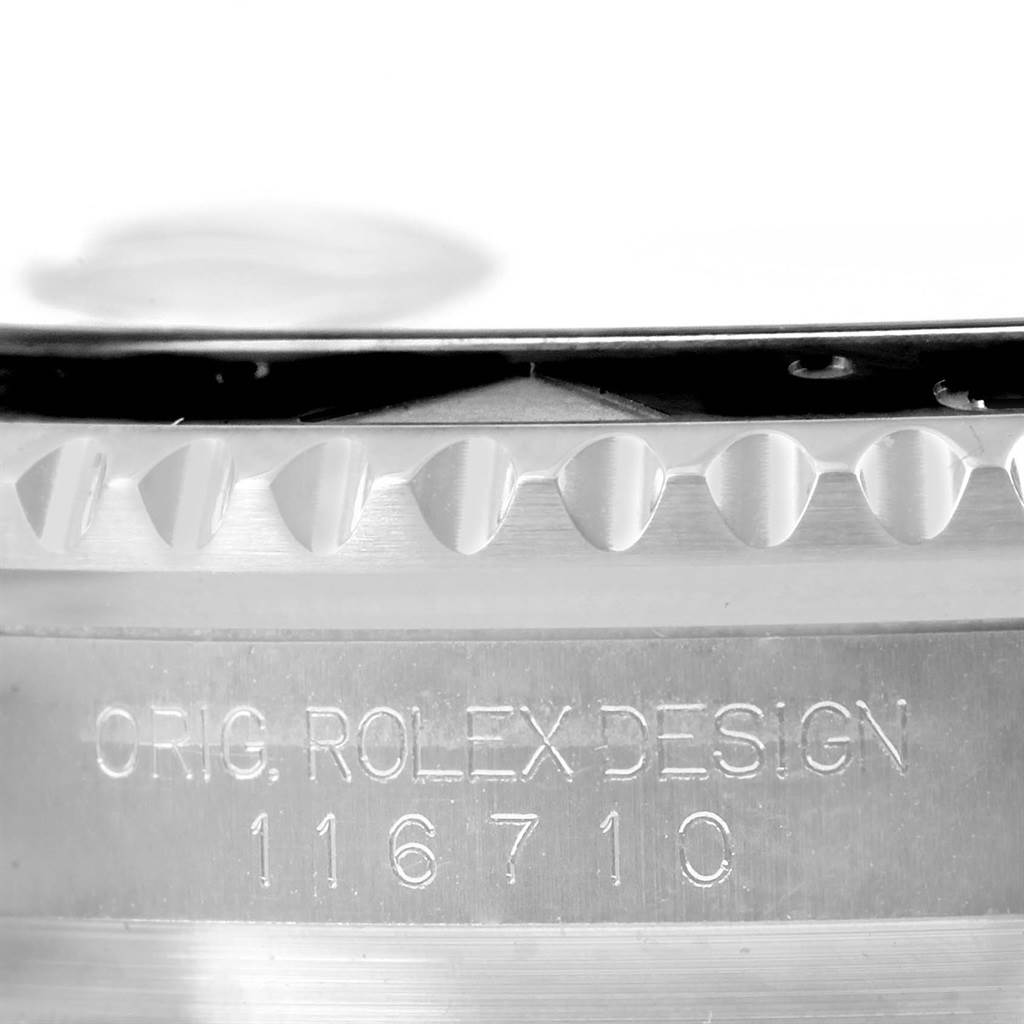 The image shows a close-up side angle of the bezel and case side of a Rolex GMT-Master 116710 Men's Stainless Steel Black Dial 116710 Men's Stainless Steel Black Dial, featuring "ORIG. ROLEX DESIGN 116710" engravings.