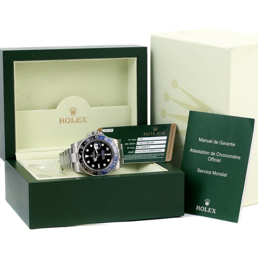 The image shows a Rolex GMT-Master 116710 Men's Stainless Steel Black Dial 116710 Men's Stainless Steel Black Dial watch, its box, warranty card, and manual from a front angle.