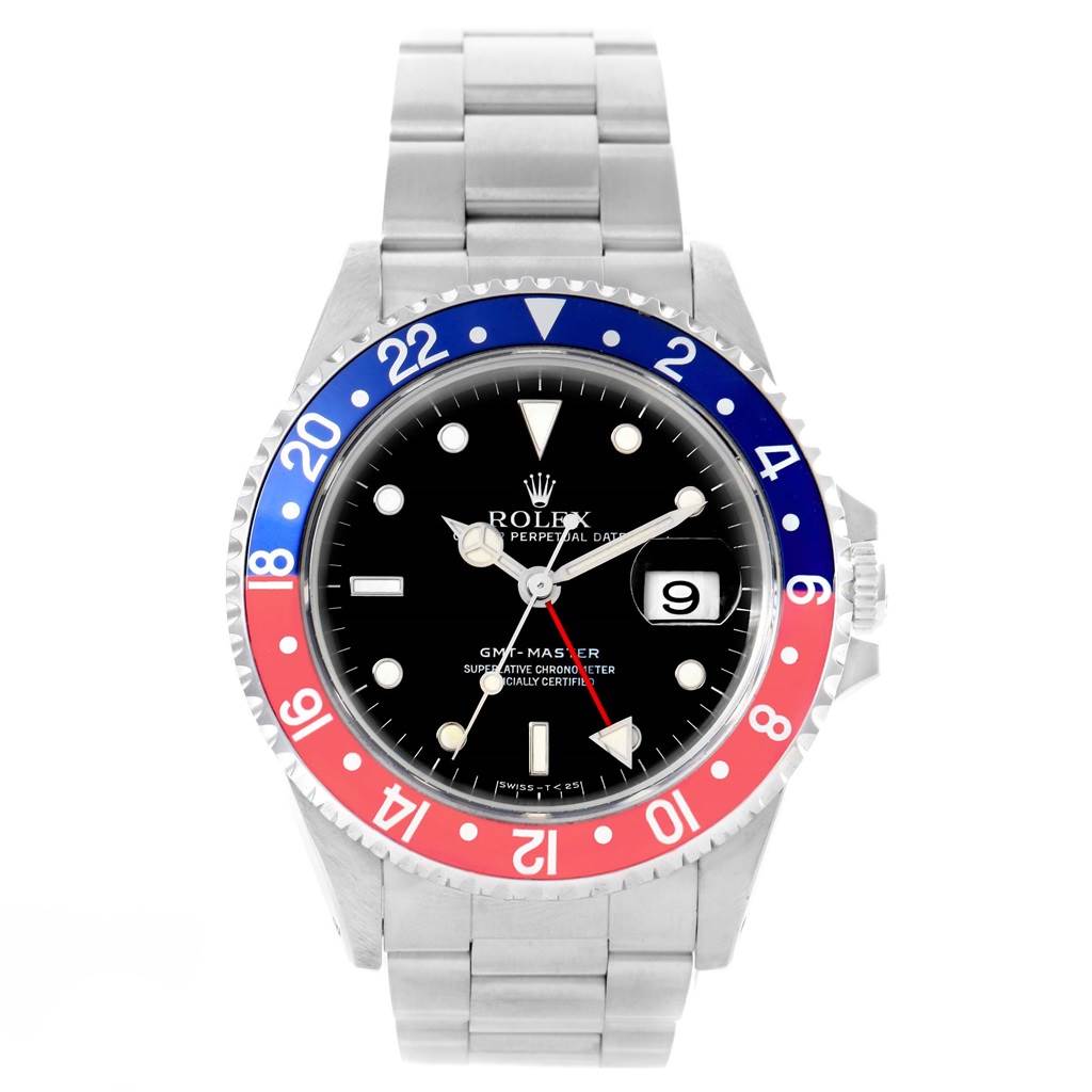 The image shows a front view of a Rolex GMT-Master 16700 Men's Stainless Steel Black Dial 16700 Men's Stainless Steel Black Dial watch featuring its bezel, dial, date, and bracelet.