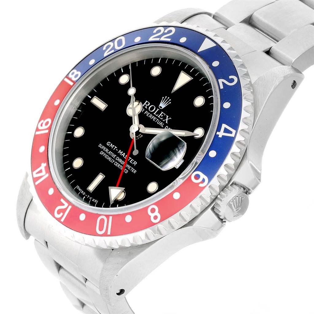 This is an angled view of the Rolex GMT-Master 16700 Men's Stainless Steel Black Dial 16700 Men's Stainless Steel Black Dial watch showing the bezel, dial, bracelet, crown, and date magnifier.