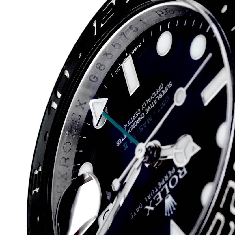 This image shows a close-up angle of the watch face and bezel of the Rolex GMT-Master 116710 Men
s Stainless Steel Black Dial 116710 Men
s Stainless Steel Black Dial.
