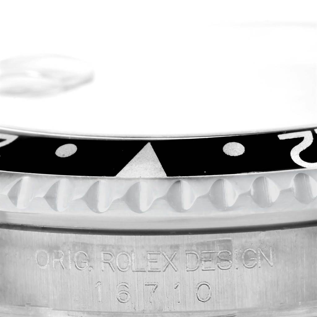 This image shows a close-up of the bezel and case side of a Rolex GMT-Master 16710 Men's Stainless Steel Black Dial 16710 Men's Stainless Steel Black Dial watch, highlighting the model number 16710.