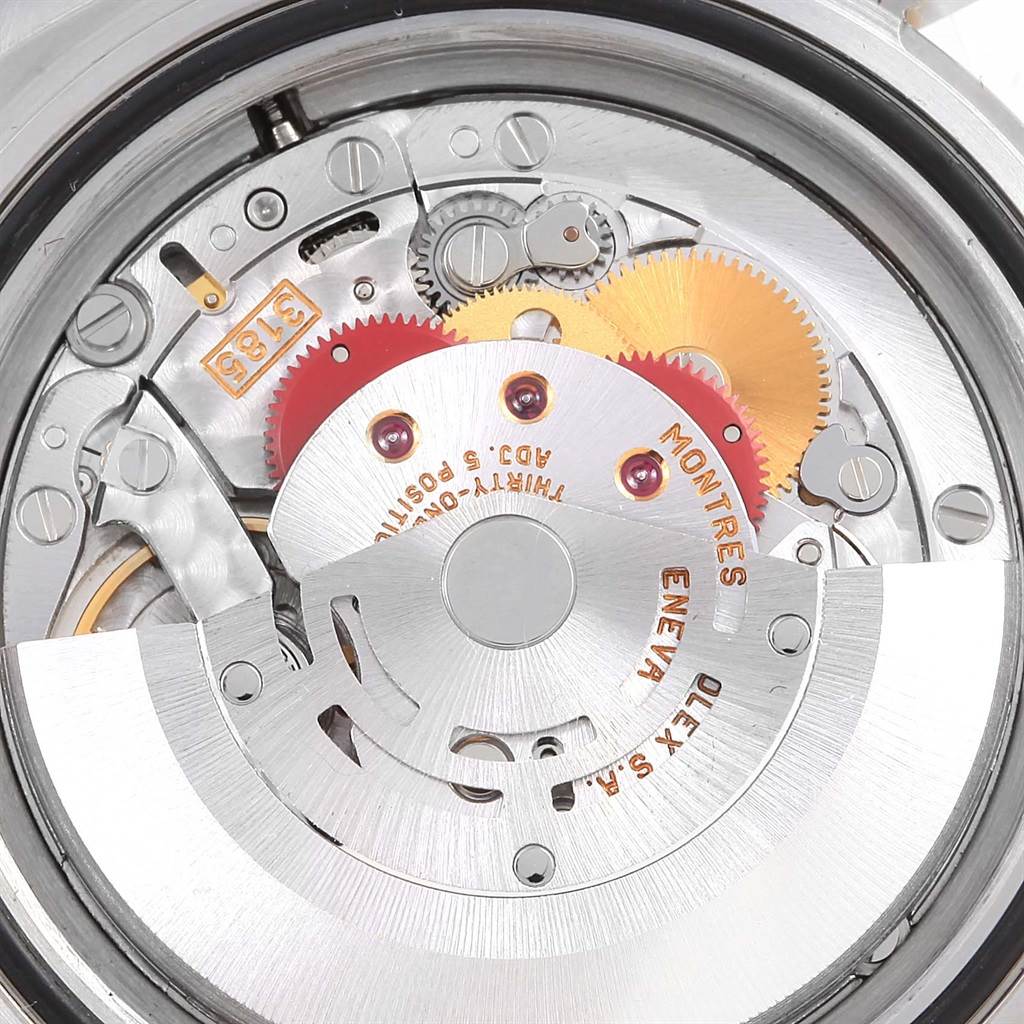 The image shows the internal mechanism of a Rolex GMT-Master 16713 Men's Stainless Steel Black Dial 16713 Men's Stainless Steel Black Dial model viewed from the back, highlighting gears and the rotor.