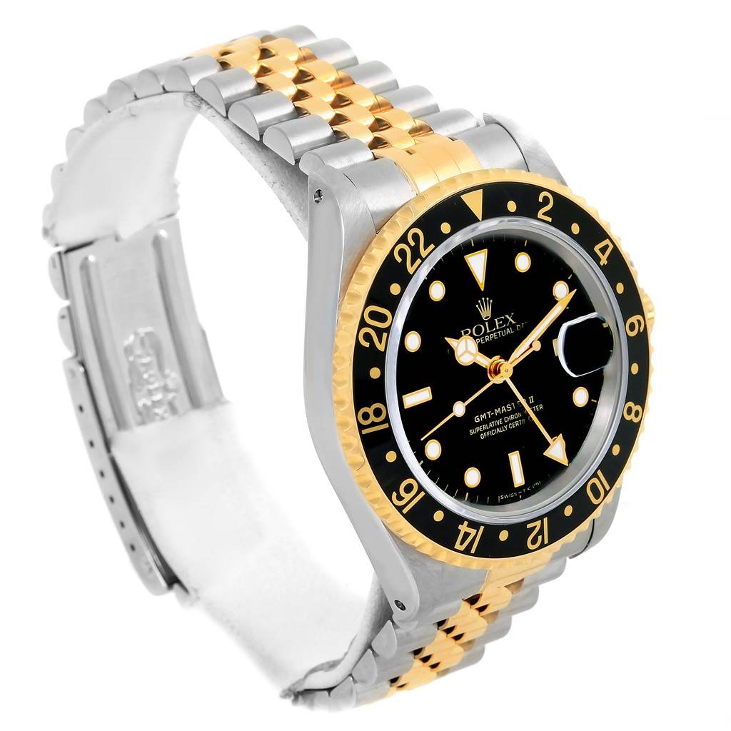 The image shows an angled view of the Rolex GMT-Master 16713 Men's Stainless Steel Black Dial 16713 Men's Stainless Steel Black Dial wristwatch, highlighting the two-tone bracelet, black dial, and bezel.