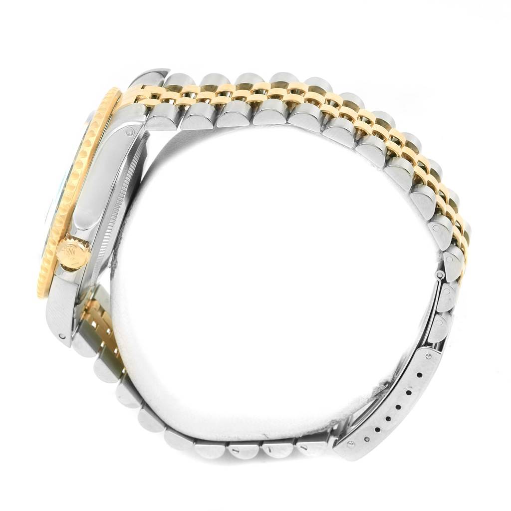 The image shows a side view of a Rolex GMT-Master 16713 Men's Stainless Steel Black Dial 16713 Men's Stainless Steel Black Dial watch, highlighting the bezel, crown, and two-tone bracelet.