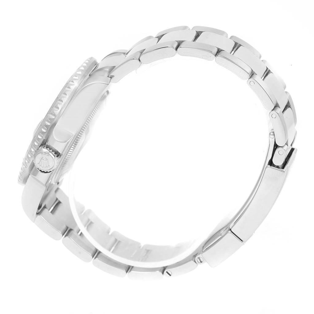 This image shows a side view of the Rolex GMT-Master 116710 Men's Stainless Steel Black Dial 116710 Men's Stainless Steel Black Dial watch, featuring the case, bezel, crown, and bracelet.