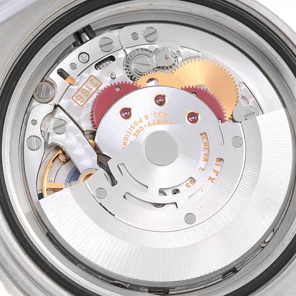 The image shows a close-up view of the movement and internal mechanisms of the Rolex GMT-Master 116710 Men's Stainless Steel Black Dial 116710 Men's Stainless Steel Black Dial watch.