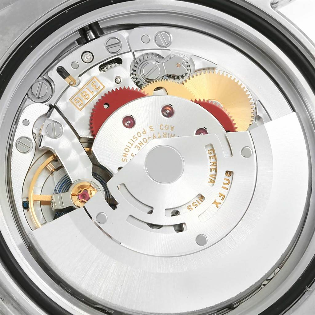 This image shows the movement and internal components of a Rolex GMT-Master 116710 Men
s Stainless Steel Black Dial 116710 Men
s Stainless Steel Black Dial watch from a rear angle.