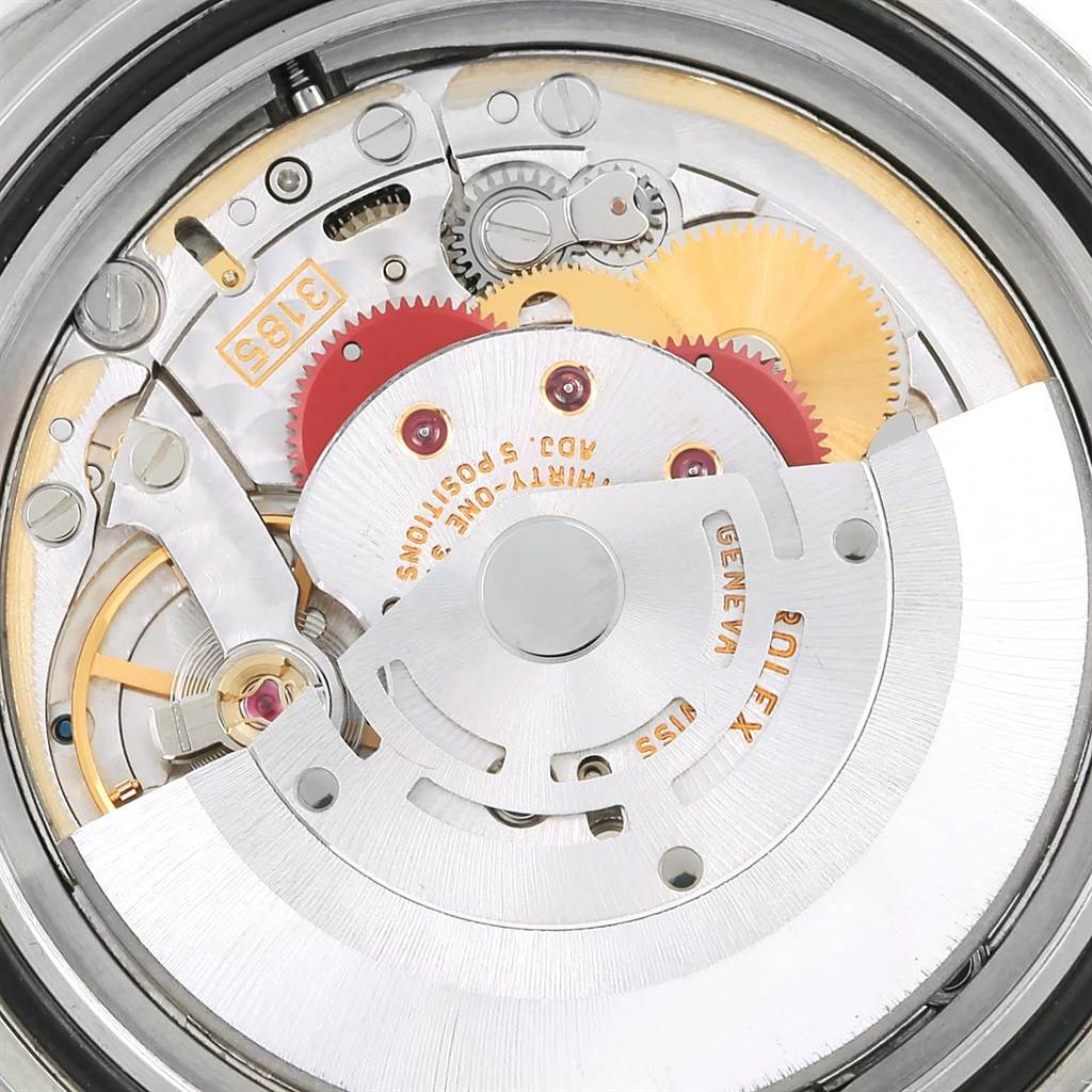 The image shows a close-up view of the movement mechanism of a Rolex GMT-Master 16710 Men's Stainless Steel Black Dial 16710 Men's Stainless Steel Black Dial watch.
