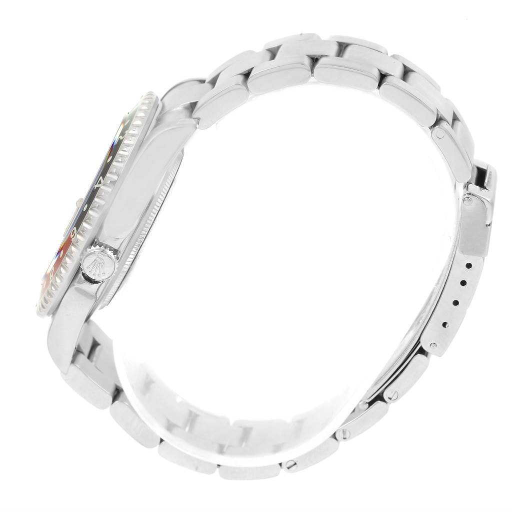 This side view of the Rolex GMT-Master 16710 Men's Stainless Steel Black Dial 16710 Men's Stainless Steel Black Dial watch shows the bracelet, clasp, crown, and the edge of the bezel.