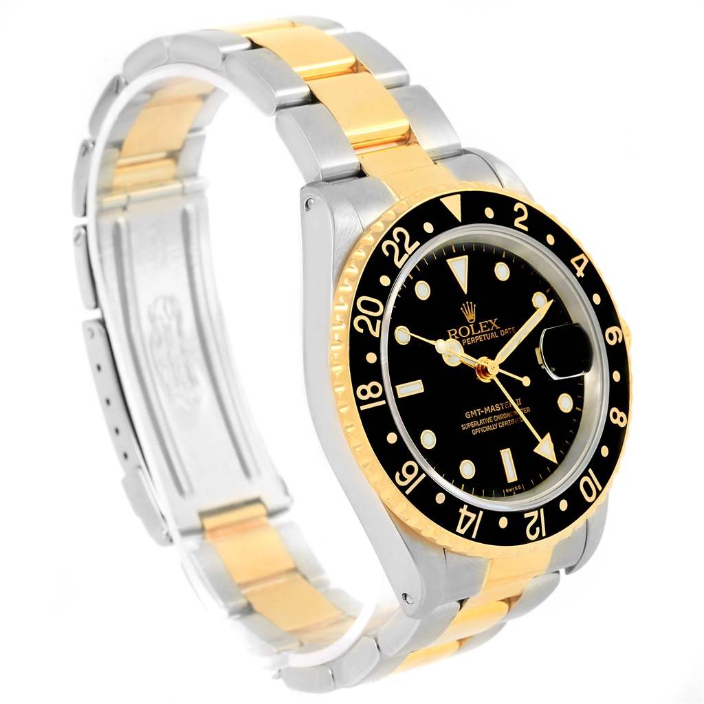 The image shows a Rolex GMT-Master 16713 Men's Stainless Steel Black Dial 16713 Men's Stainless Steel Black Dial watch at a slight angle, displaying the two-tone bracelet, black dial, and the bezel with the 24-hour markings.