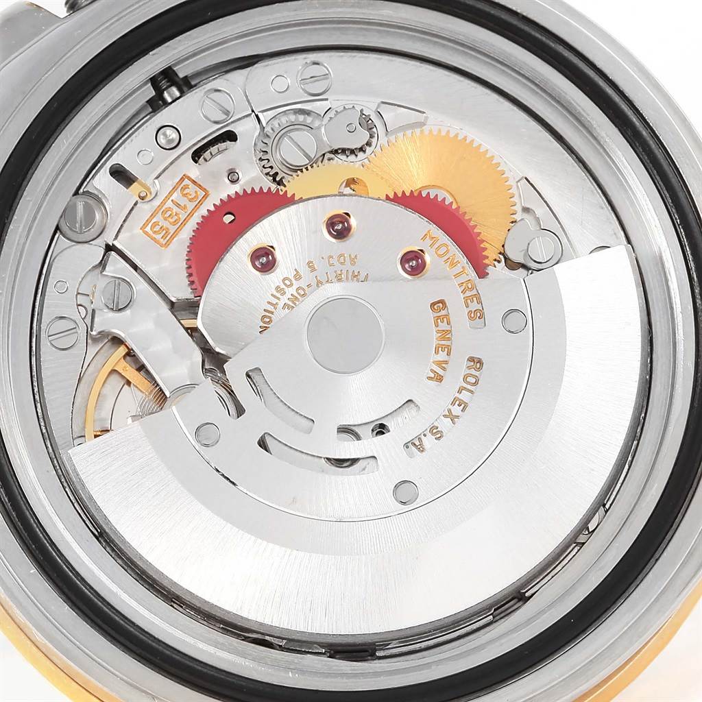 This image shows the internal mechanism and movement components of a Rolex GMT-Master 16713 Men's Stainless Steel Black Dial 16713 Men's Stainless Steel Black Dial watch from a close-up angle.