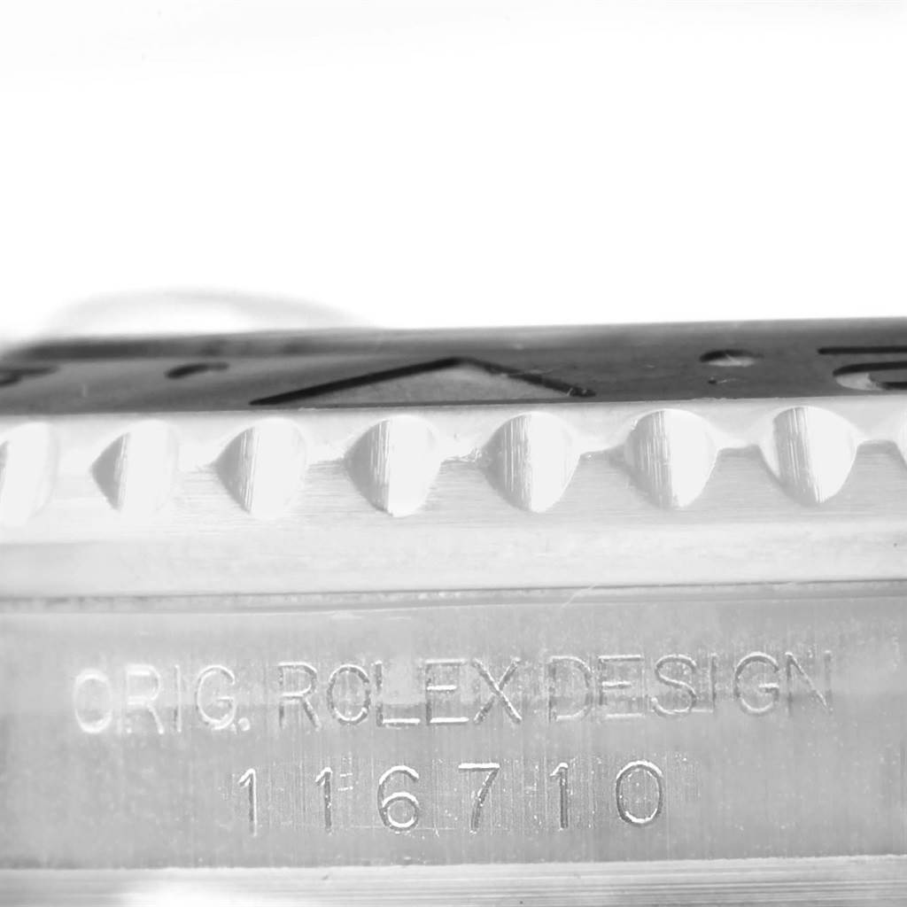 The image shows a close-up side view of the bezel and reference number of a Rolex GMT-Master 116710 Men's Stainless Steel Black Dial 116710 Men's Stainless Steel Black Dial model watch.