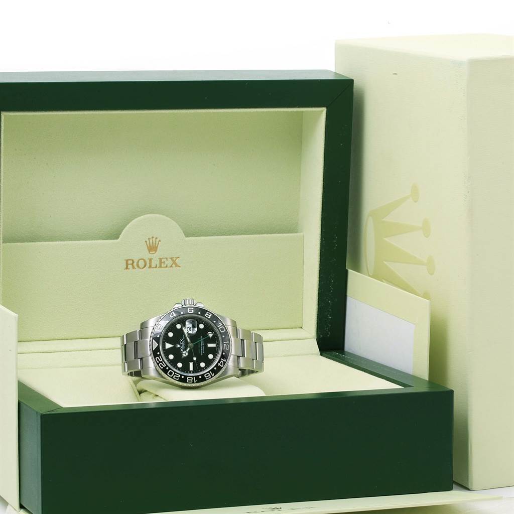 The Rolex GMT-Master 116710 Men's Stainless Steel Black Dial 116710 Men's Stainless Steel Black Dial watch is shown at a front angle in its original box, highlighting the face and bracelet.