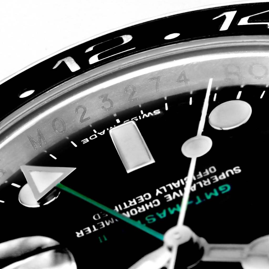 The close-up image shows the GMT hand, hour markers, and part of the bezel of the Rolex GMT-Master 116710 Men's Stainless Steel Black Dial 116710 Men's Stainless Steel Black Dial watch.