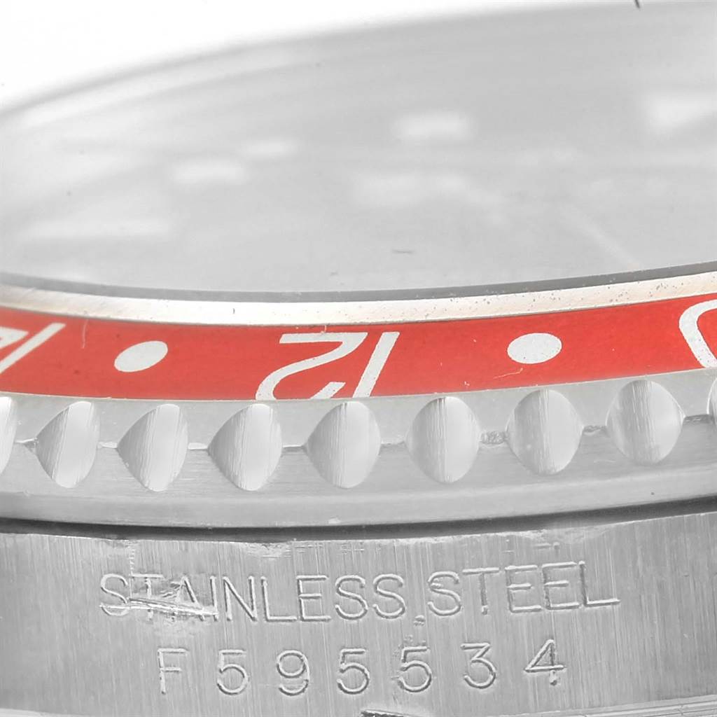 This close-up image shows the bezel with the 24-hour marker and part of the casing with the model number on the Rolex GMT-Master 16710 Men
s Stainless Steel Black Dial 16710 Men
s Stainless Steel Black Dial.