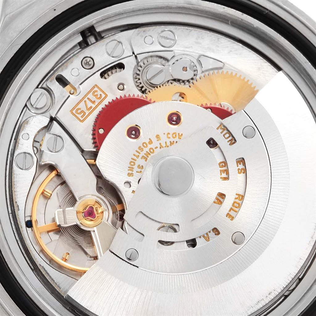 This image shows a close-up view of the internal movement mechanism of a Rolex GMT-Master 16700 Men's Stainless Steel Black Dial 16700 Men's Stainless Steel Black Dial watch.