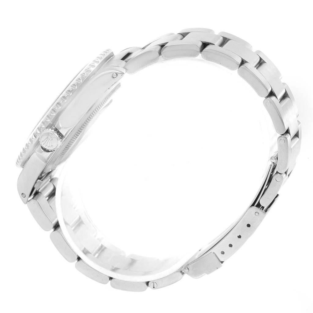 The image shows a Rolex GMT-Master 16700 Men's Stainless Steel Black Dial 16700 Men's Stainless Steel Black Dial watch from a side view, highlighting the case, crown, and bracelet.