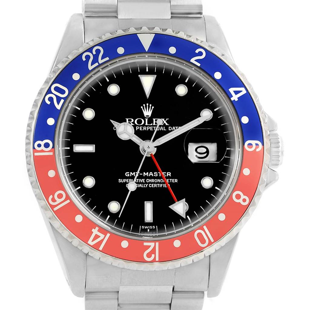 The image shows a front view of a Rolex GMT-Master 16700 Men's Stainless Steel Black Dial 16700 Men's Stainless Steel Black Dial watch, highlighting its bezel, dial, hands, date window, and bracelet.