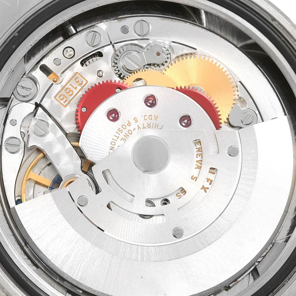 The image shows the intricate internal mechanism of the Rolex GMT-Master 116719 Men
s White Gold Black Dial 116719 Men
s White Gold Black Dial watch, viewed from the back.