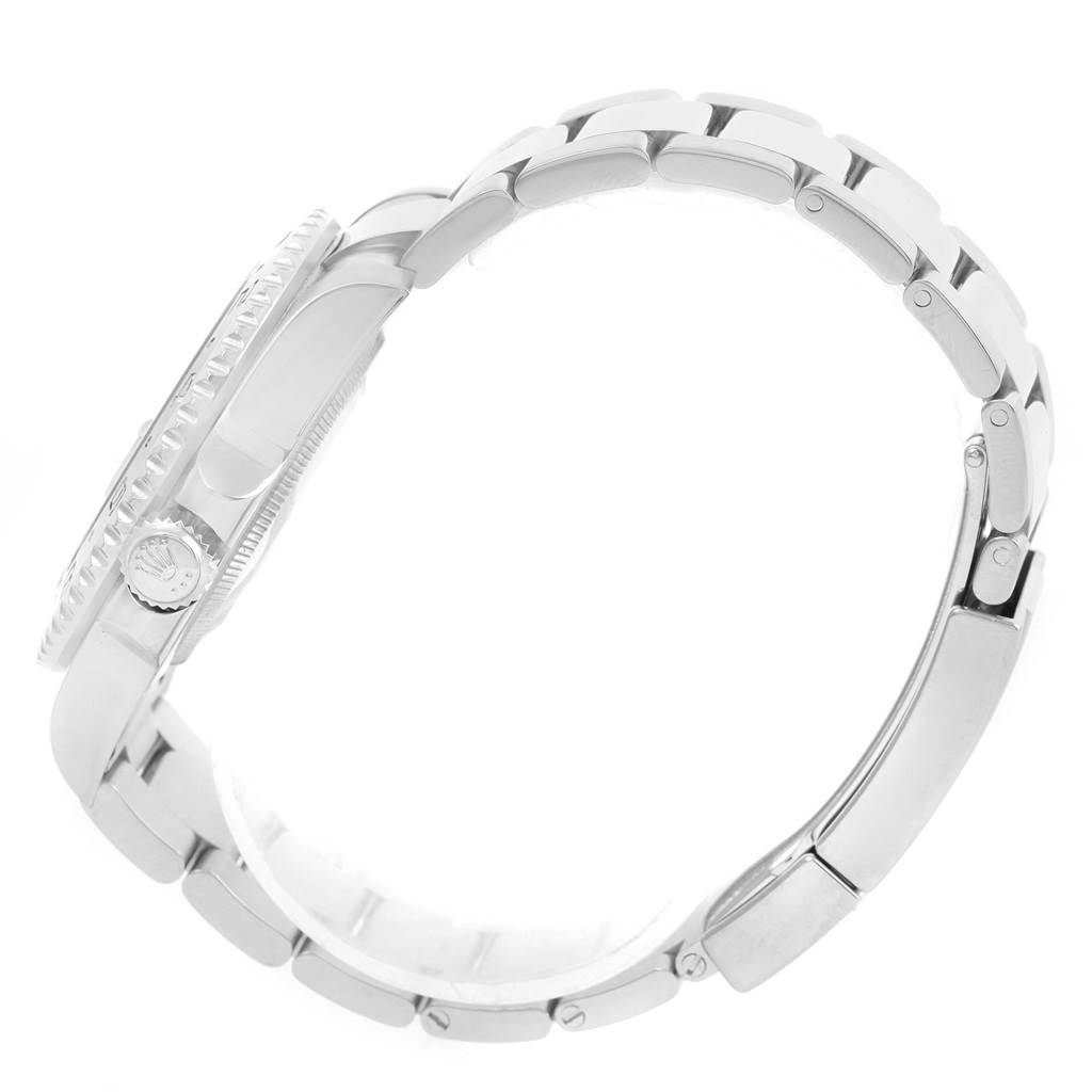 The image shows a side view of the Rolex GMT-Master 116710 Men's Stainless Steel Black Dial 116710 Men's Stainless Steel Black Dial watch, highlighting the crown, bezel, and metal bracelet.