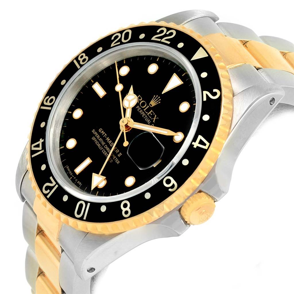 The image shows a side-angle view of a Rolex GMT-Master 16713 Men's Stainless Steel Black Dial 16713 Men's Stainless Steel Black Dial watch, highlighting the bezel, crown, face, and two-tone bracelet.