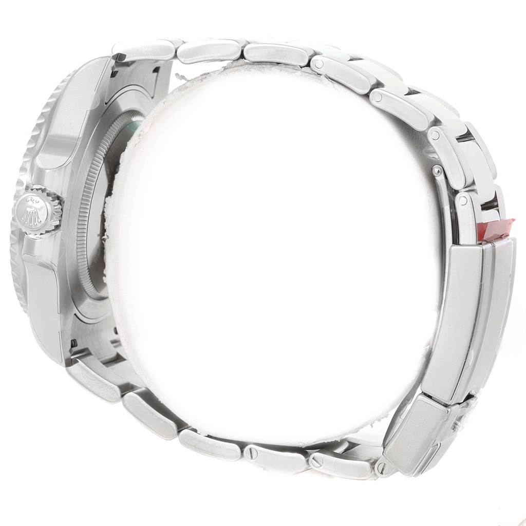 This side view image of the Rolex GMT-Master 116710 Men's Stainless Steel Black Dial 116710 Men's Stainless Steel Black Dial watch shows the crown, case, and parts of the bracelet.